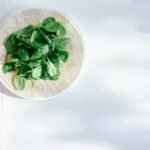 green vegetable leaves on plate