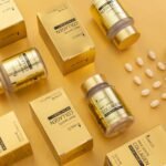 a table topped with lots of different types of pills